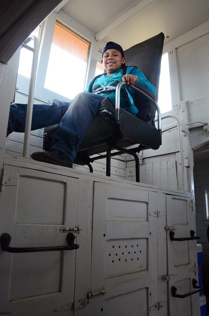 child in cupola seat